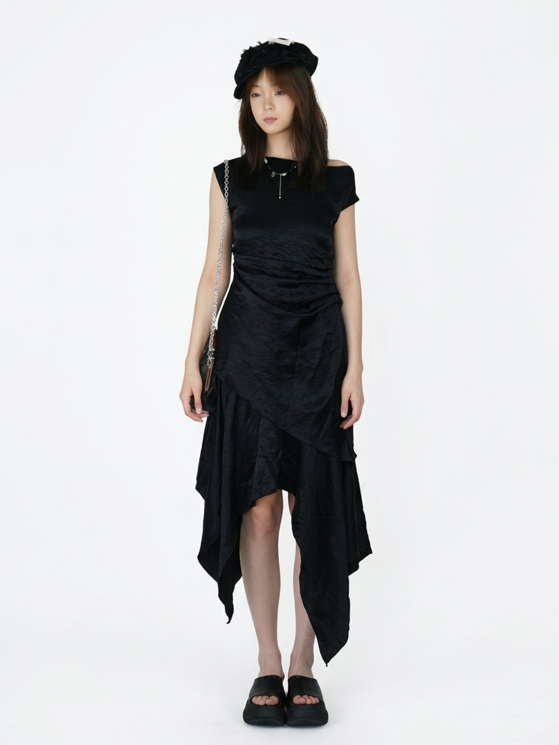 Saucer-wing skirt dress with a slanted neckline