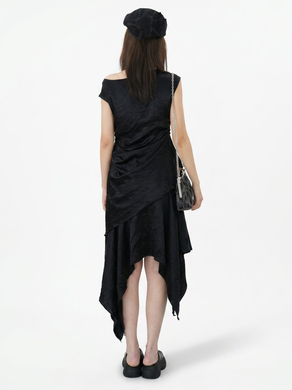 Saucer-wing skirt dress with a slanted neckline