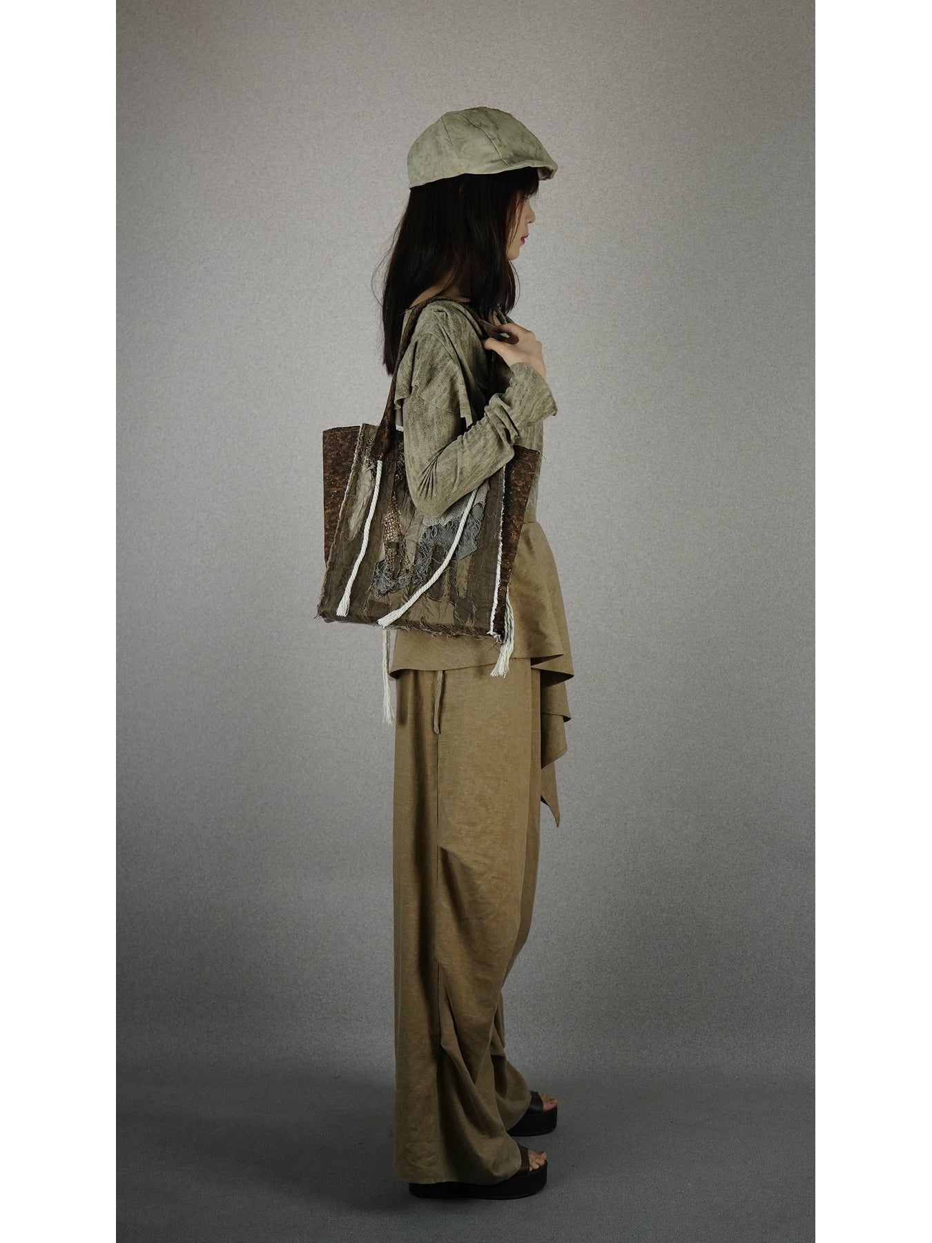 Draped-neck top with double drawstrings