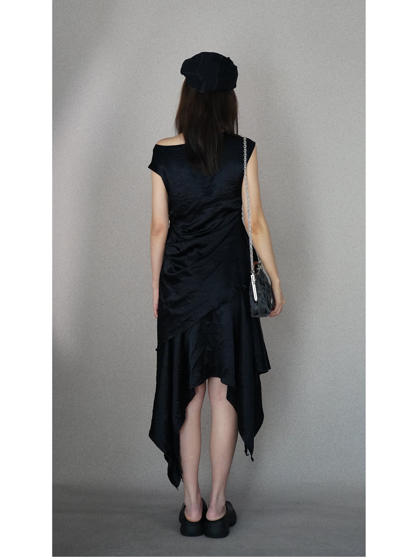 Saucer-wing skirt dress with a slanted neckline