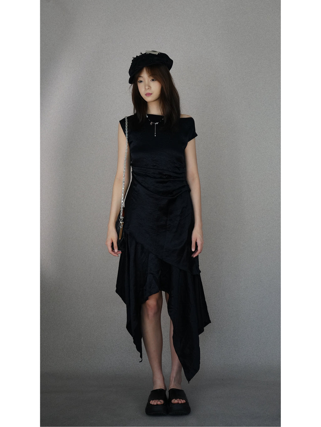 Saucer-wing skirt dress with a slanted neckline